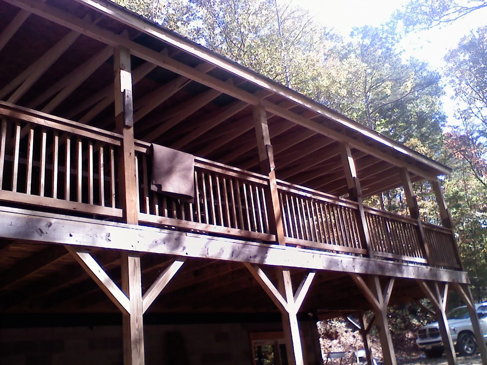 Timber framing under a new elevated porch and deck — Roof Leak Repair in Grand Ridge by Roofing Brothers